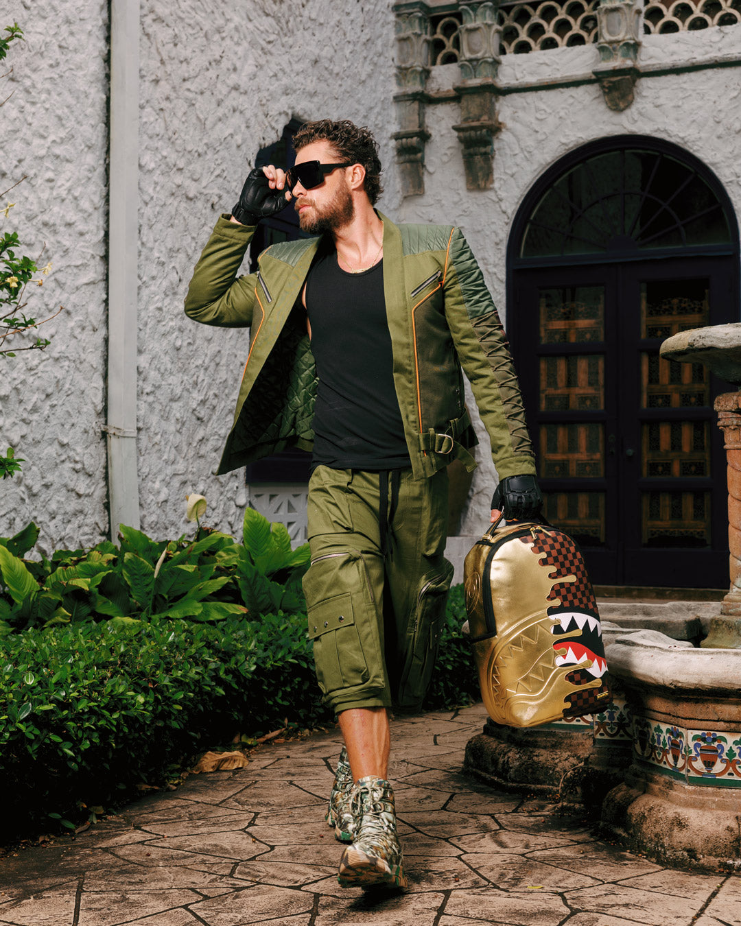 SPRAYGROUNDÂ® BACKPACK SHARKS IN PARIS GOLD DRIP BACKPACK