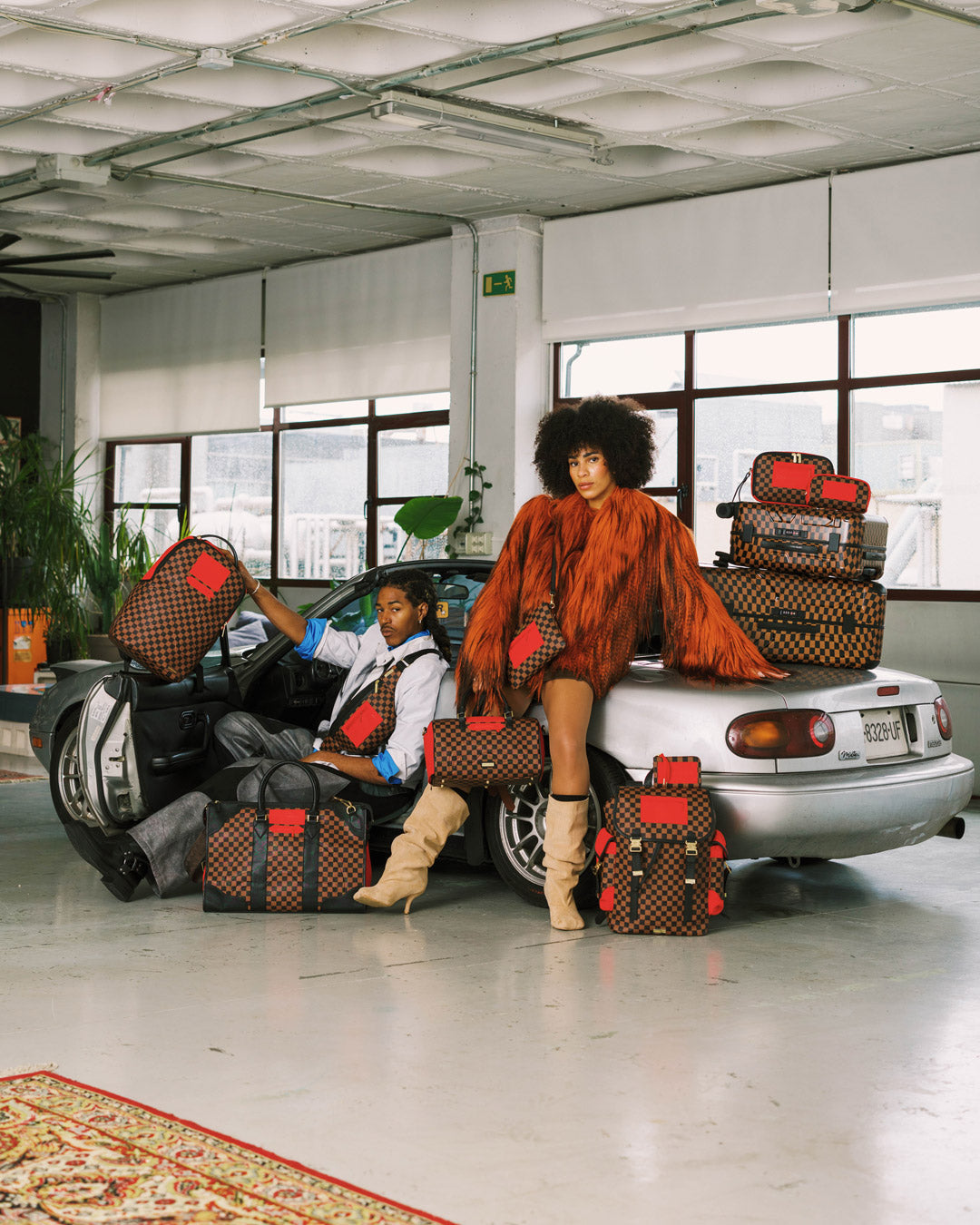SPRAYGROUND® LUGGAGE RED REDEMPTION CARRY-ON LUGGAGE