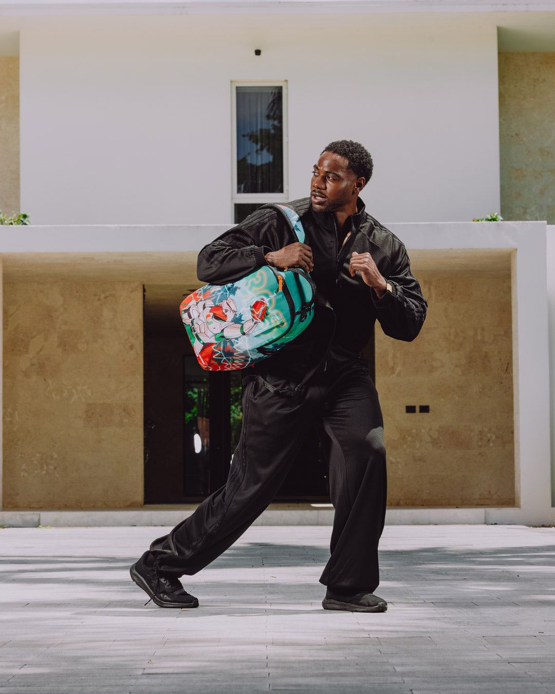 SPRAYGROUND® BACKPACK UNIVERSITY OF MIAMI HURRICANES - TOUCHDOWN THUNDER