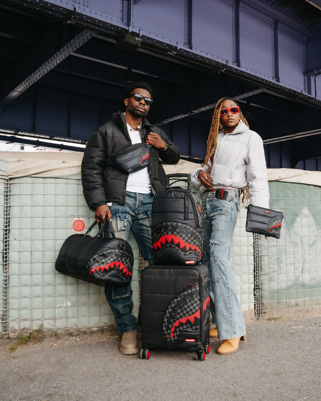 SPRAYGROUND® POUCHETTE BLACK PUFFER CHECK CROSSOVER CLUTCH