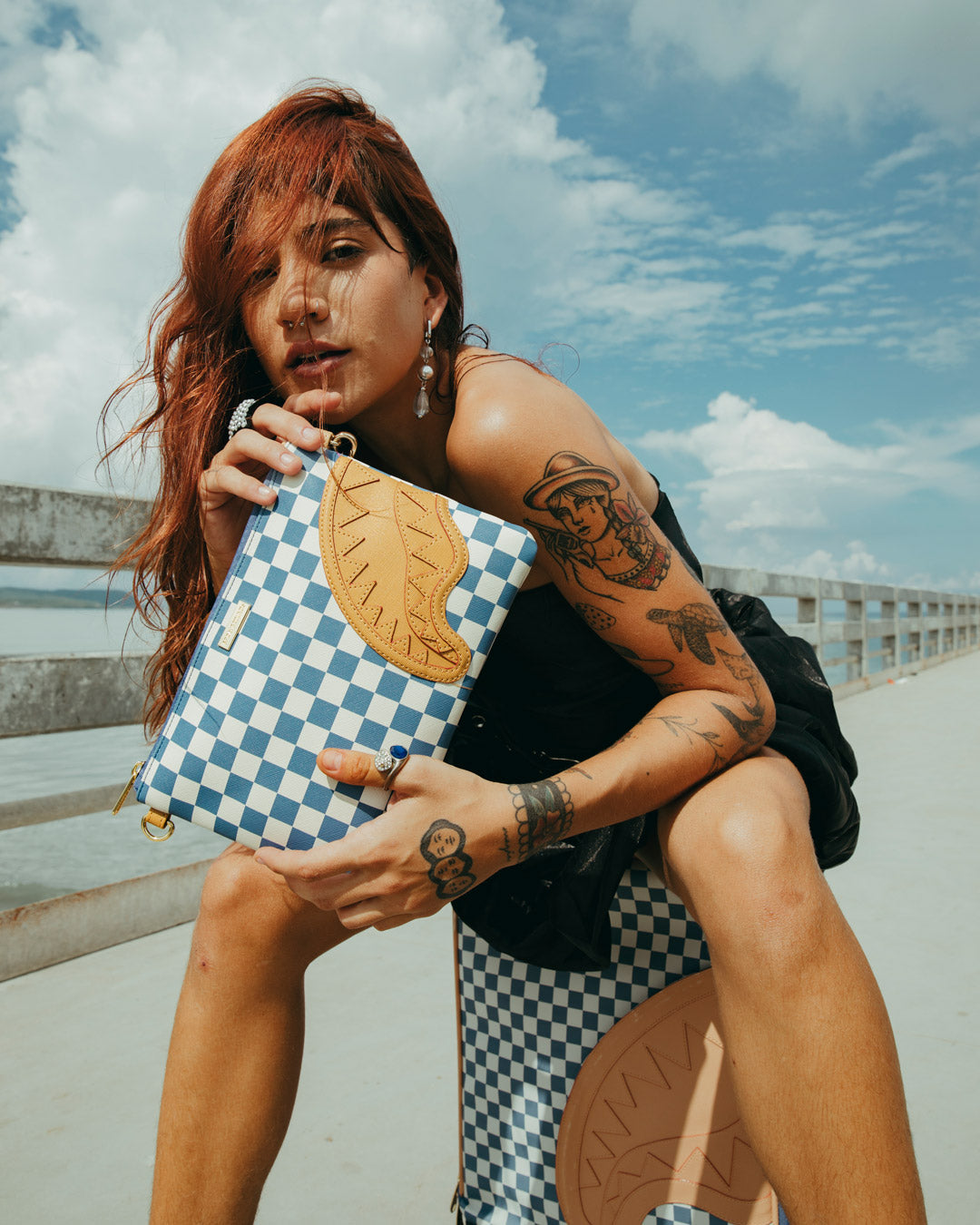 SPRAYGROUND® POUCHETTE LETTER CHECKERS CROSSOVER CLUTCH