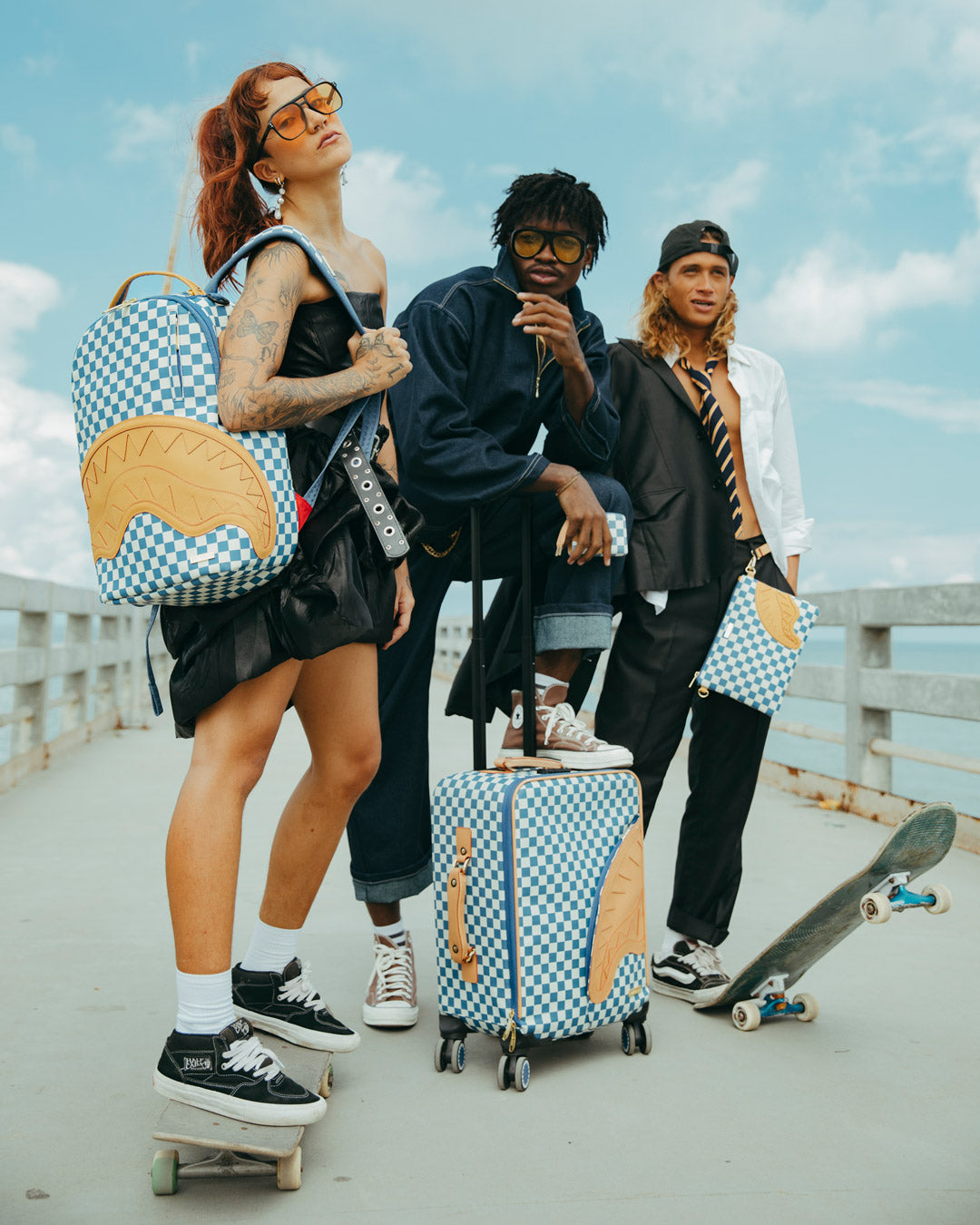 SPRAYGROUND® POUCHETTE LETTER CHECKERS CROSSOVER CLUTCH