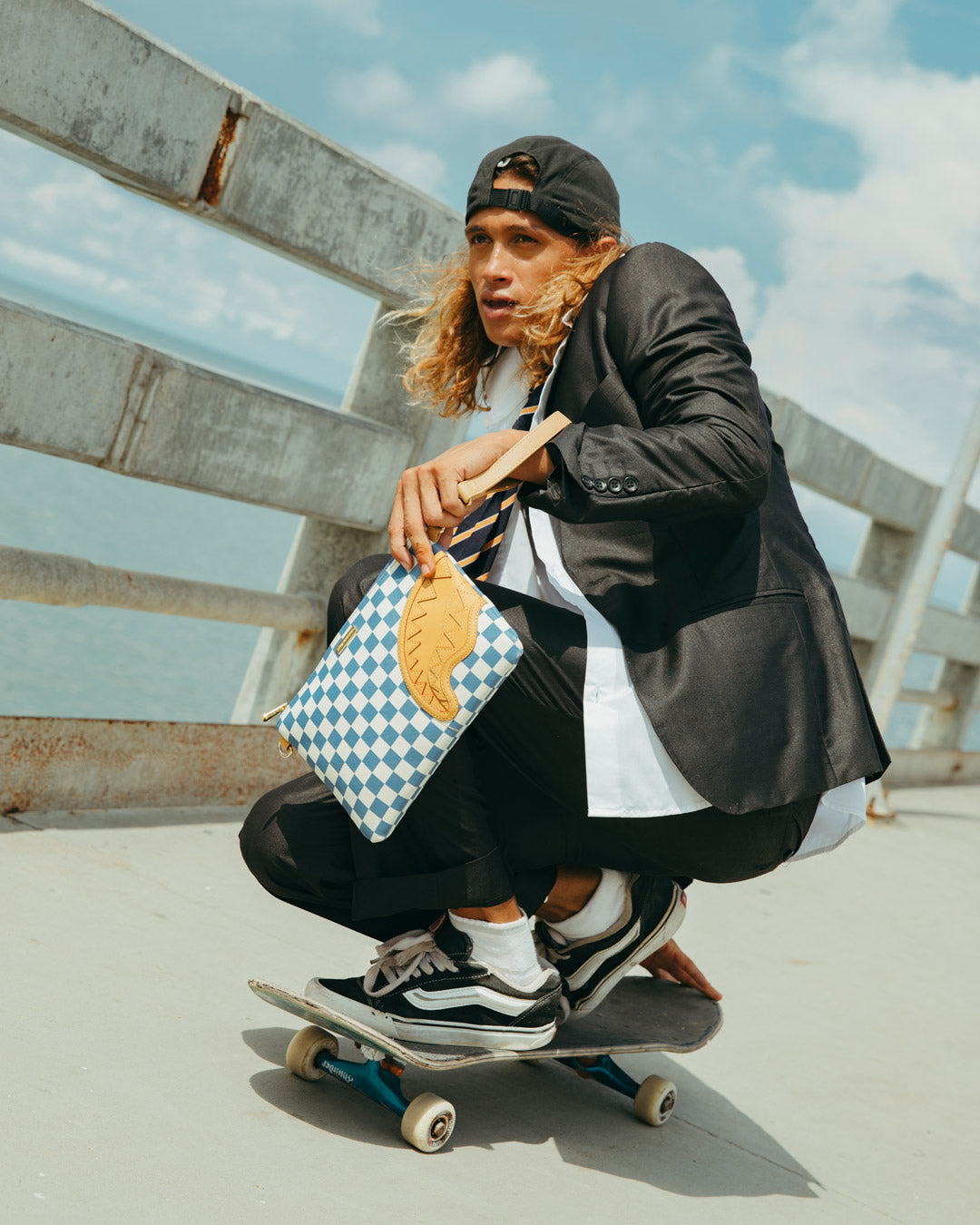 SPRAYGROUND® POUCHETTE LETTER CHECKERS CROSSOVER CLUTCH