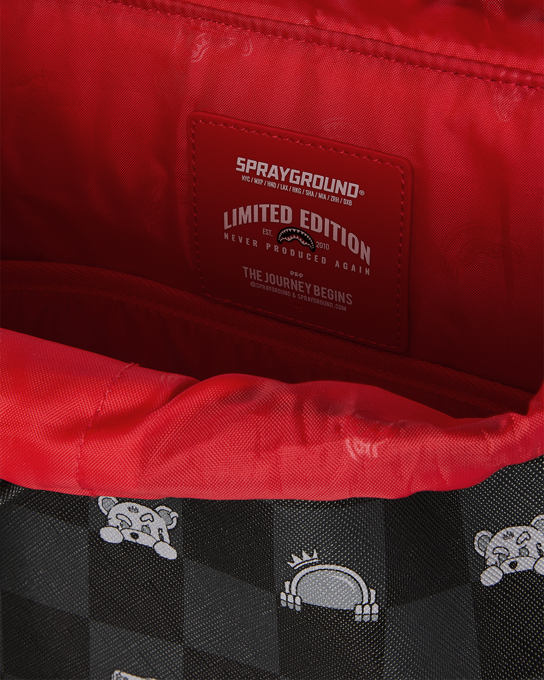 SPRAYGROUND® BACKPACK GRAY PEEKING CHARACTER CHECK MONTE CARLO BACKPACK
