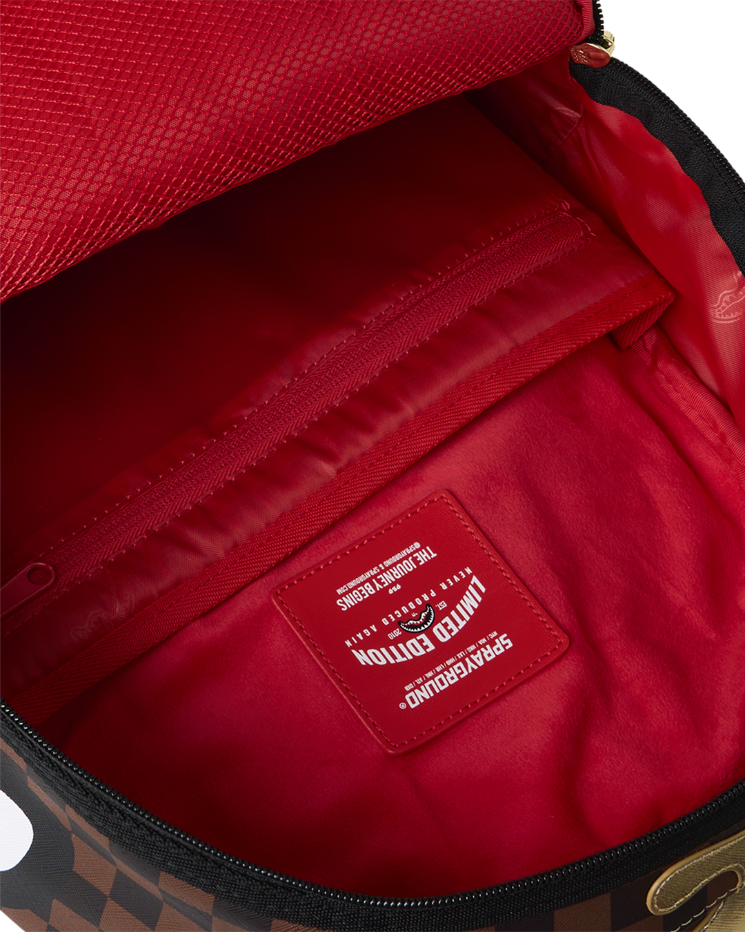 SPRAYGROUNDÂ® BACKPACK SHARKS IN PARIS GOLD DRIP BACKPACK