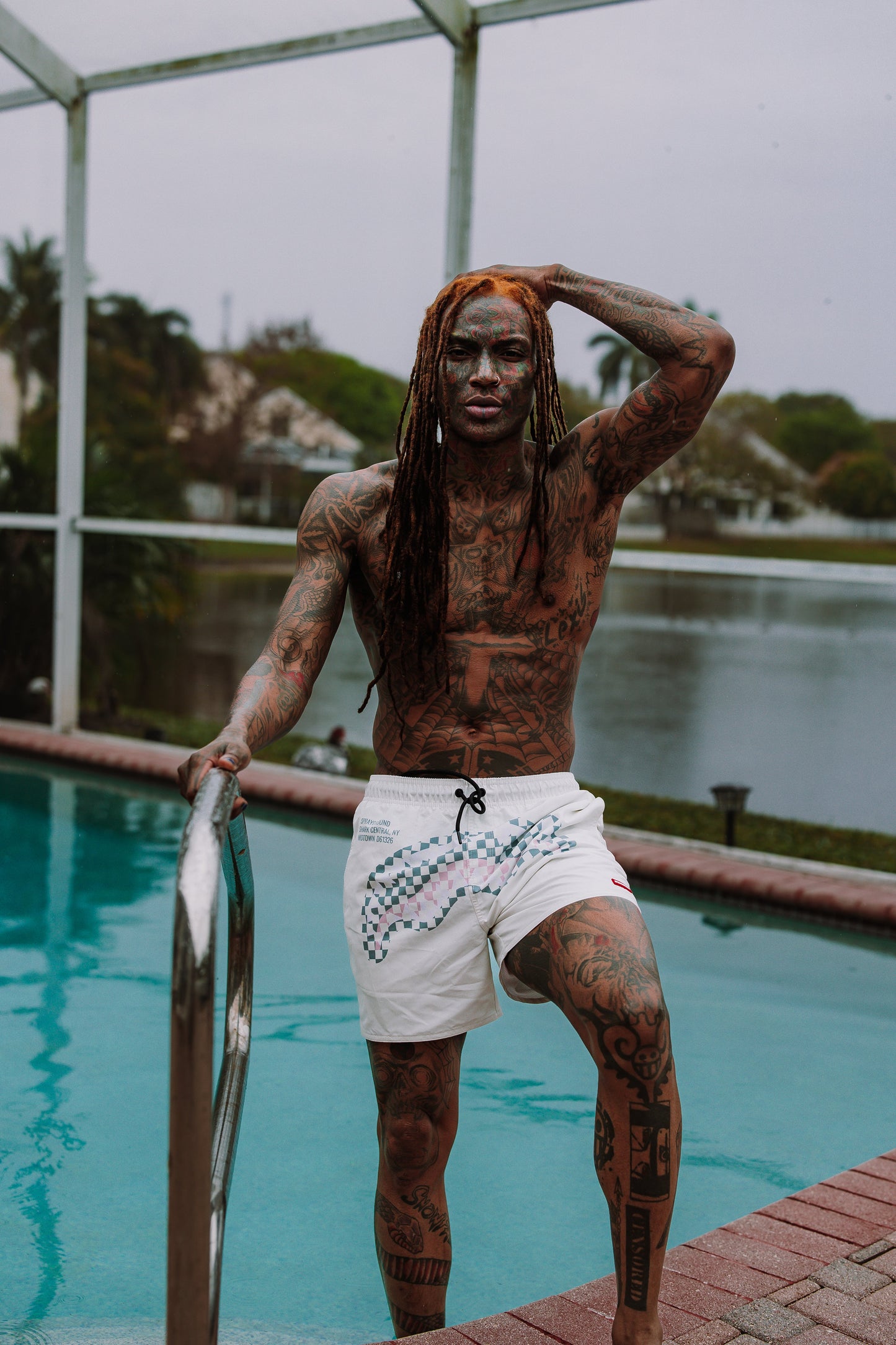 SPRAYGROUND® SWIM CREAM CHECK SHARK CENTRAL SWIM SHORTS