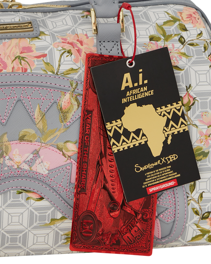 SPRAYGROUND® DUFFLE A.I. AFRICAN INTELLIGENCE ELEGANT ENERGY MINI DUFFLE - SANDFLOWER COLLAB