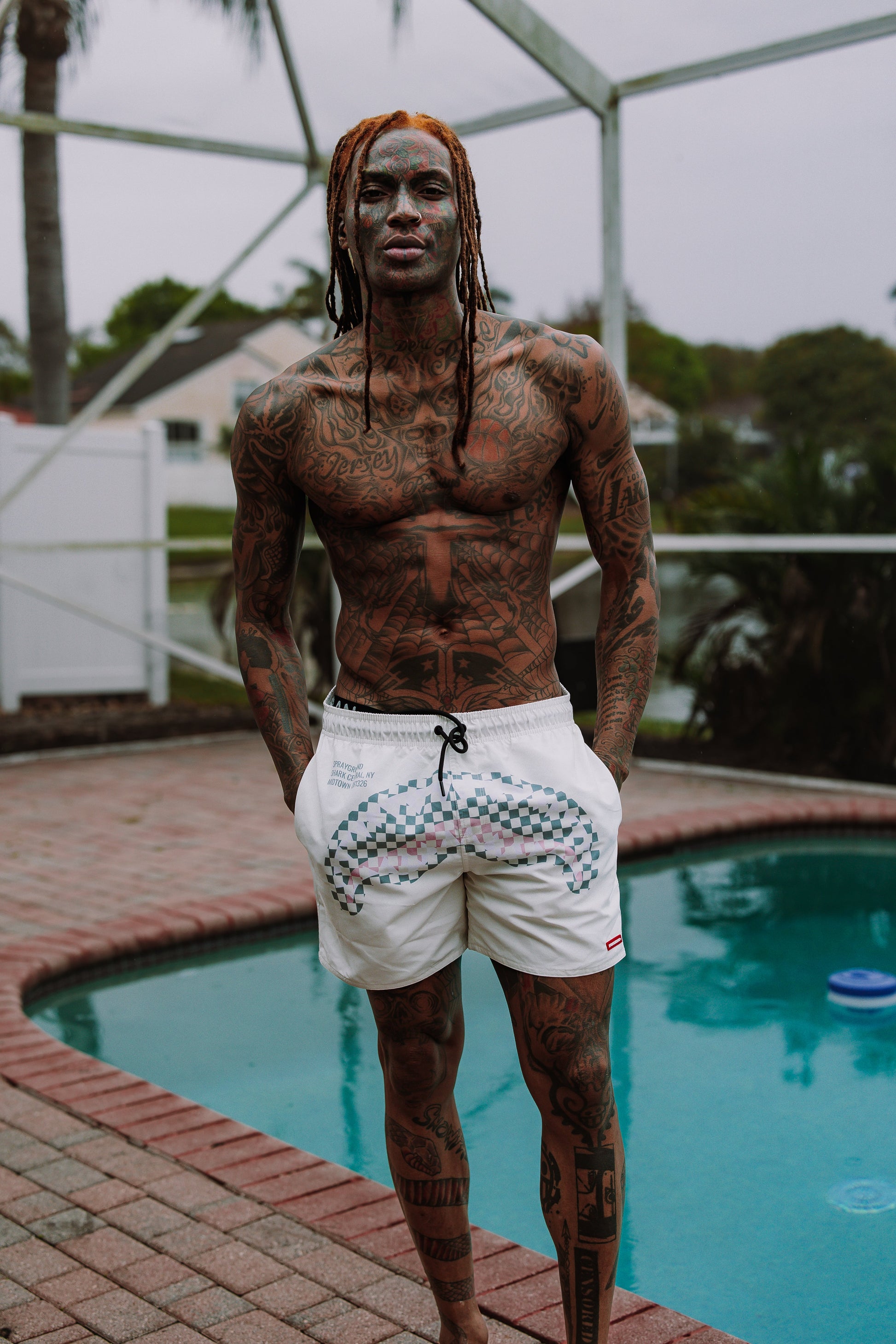 SPRAYGROUND® SWIM CREAM CHECK SHARK CENTRAL SWIM SHORTS